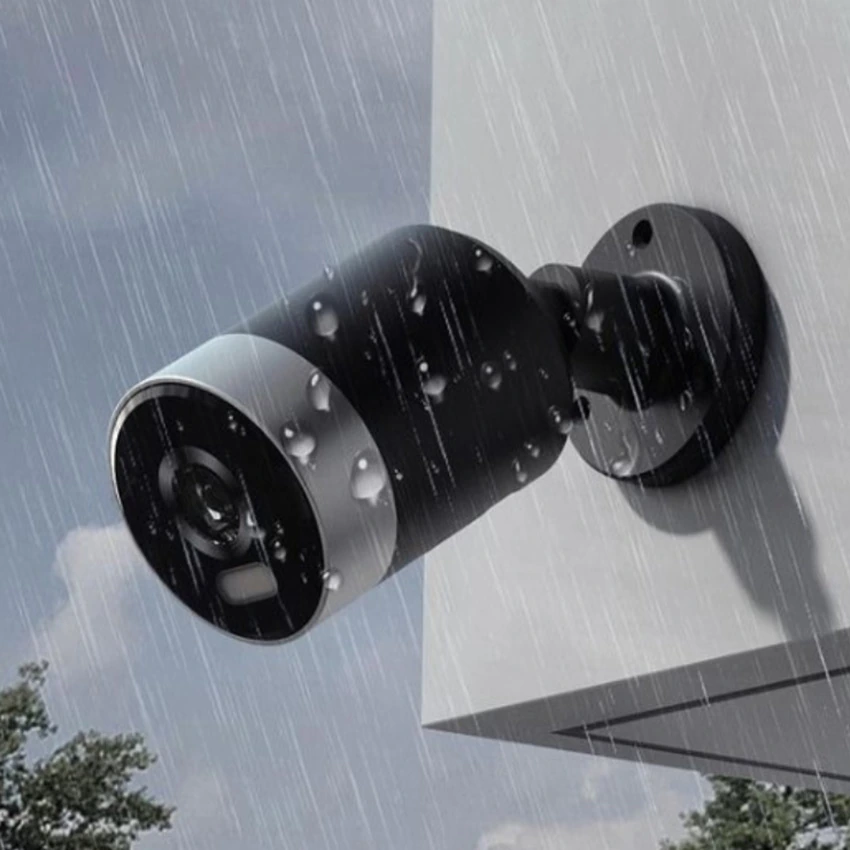 Product illustration of an ORVIBO S3 outdoor camera mounted on an exterior wall in rain
