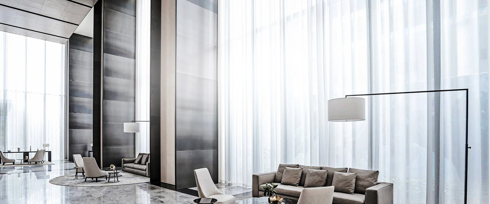 Full-height sheer curtains filtering daylight in the ORVIBO curtain room setting