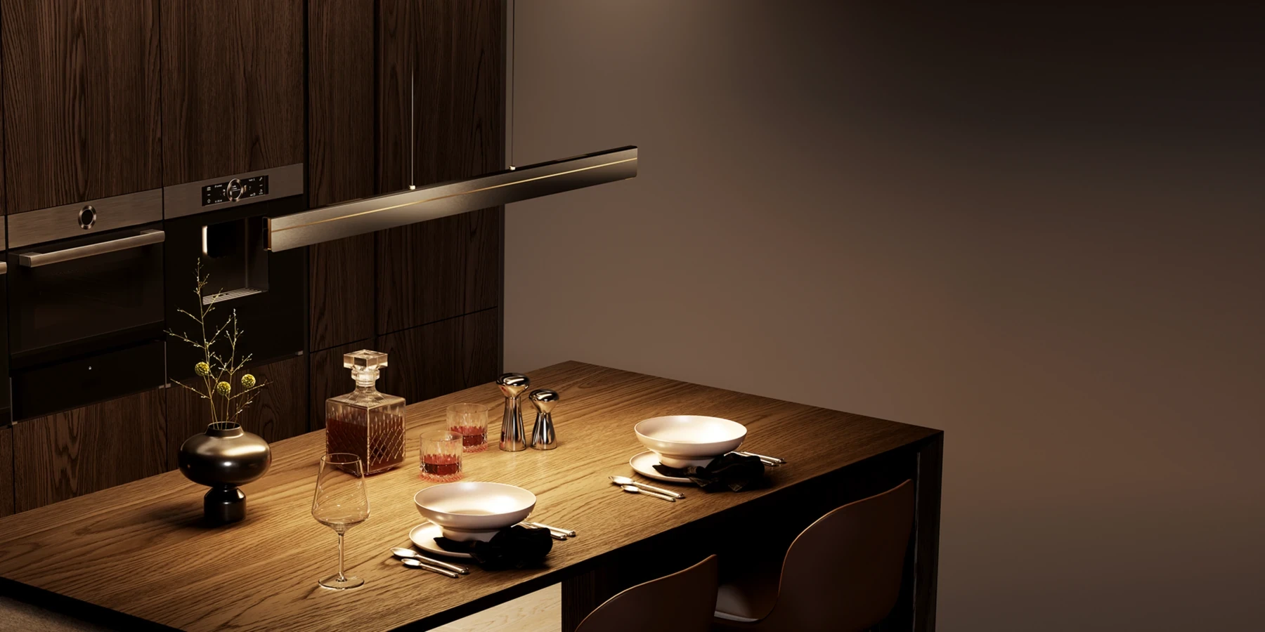Linear pendant light above a dining table